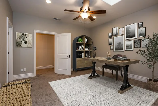 a view of a livingroom with furniture and window