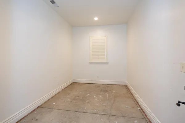 an empty room with a window