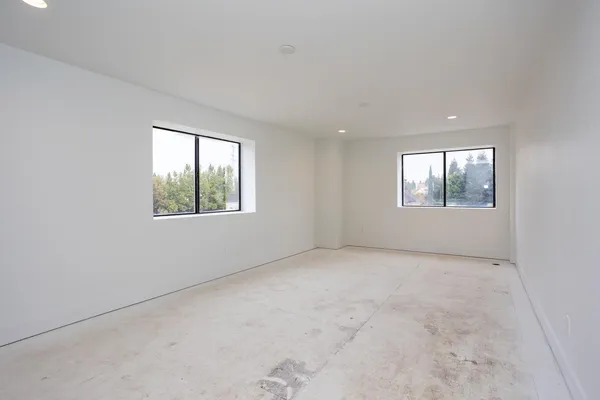 an empty room with windows