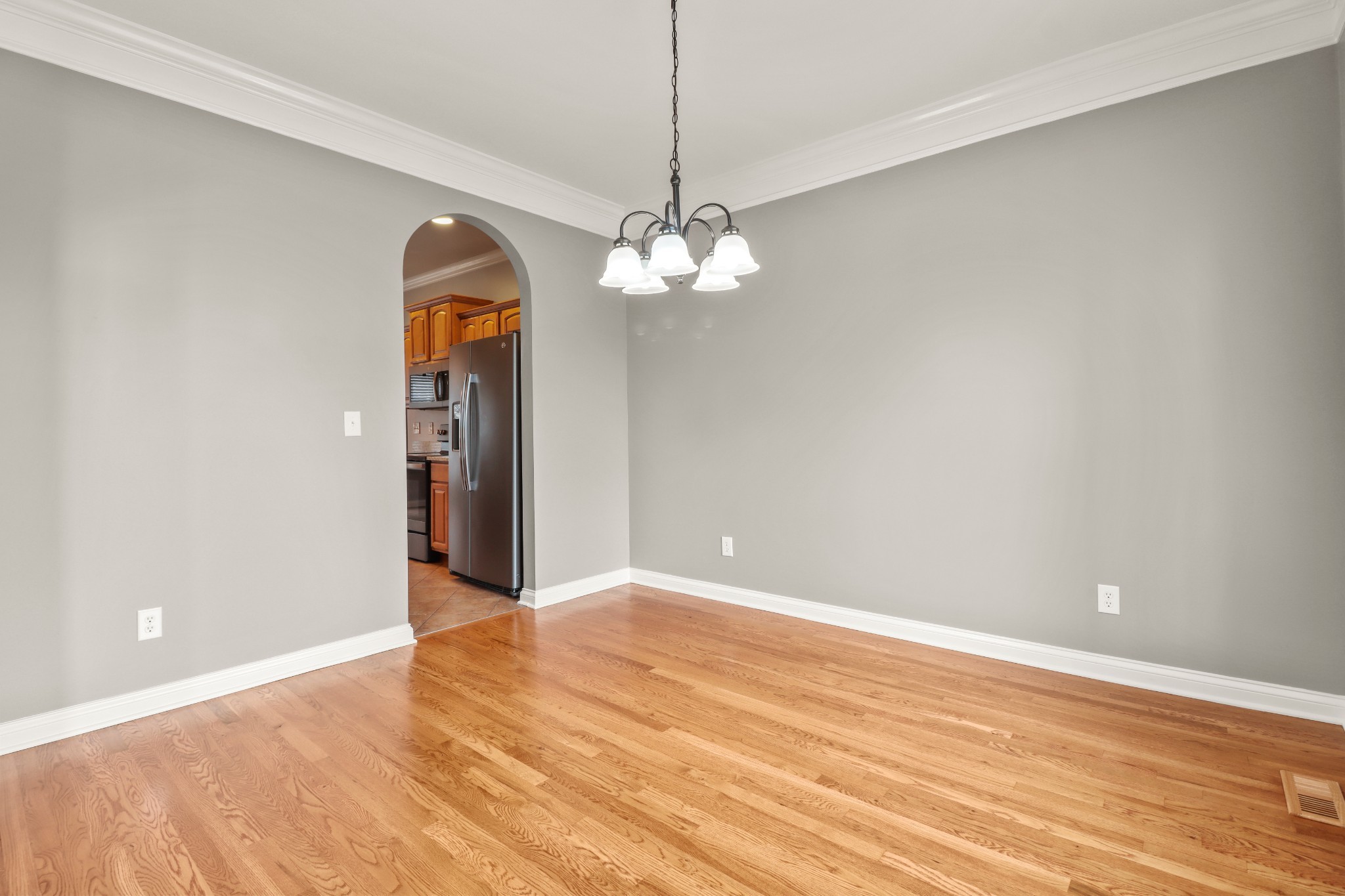 331 Tivoli Trail Springfield, TN 37172 - Photo 11 of 44 a view of a room with a chandelier fan and wooden floor