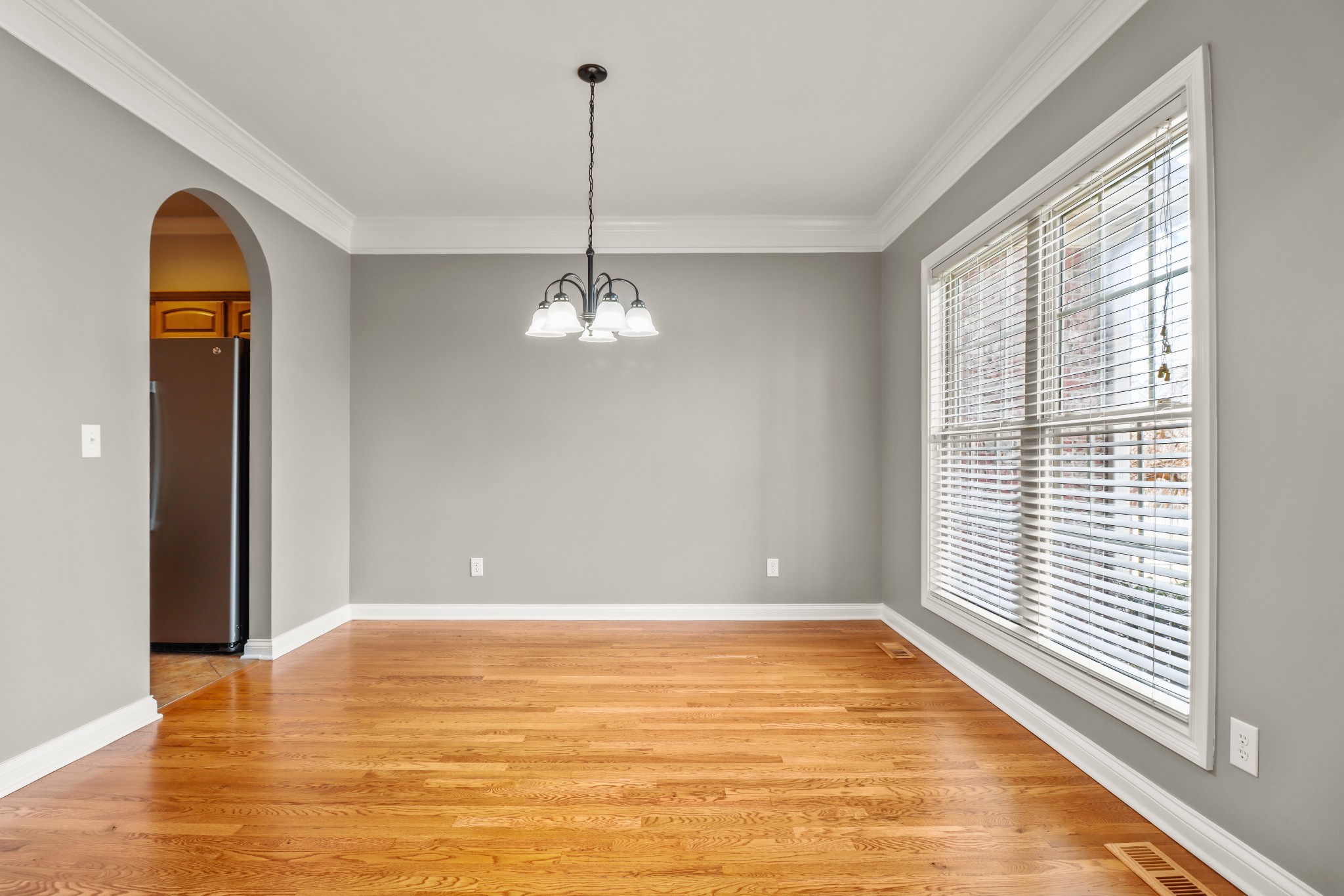 331 Tivoli Trail Springfield, TN 37172 - Photo 12 of 44 a view of empty room with wooden floor and fan