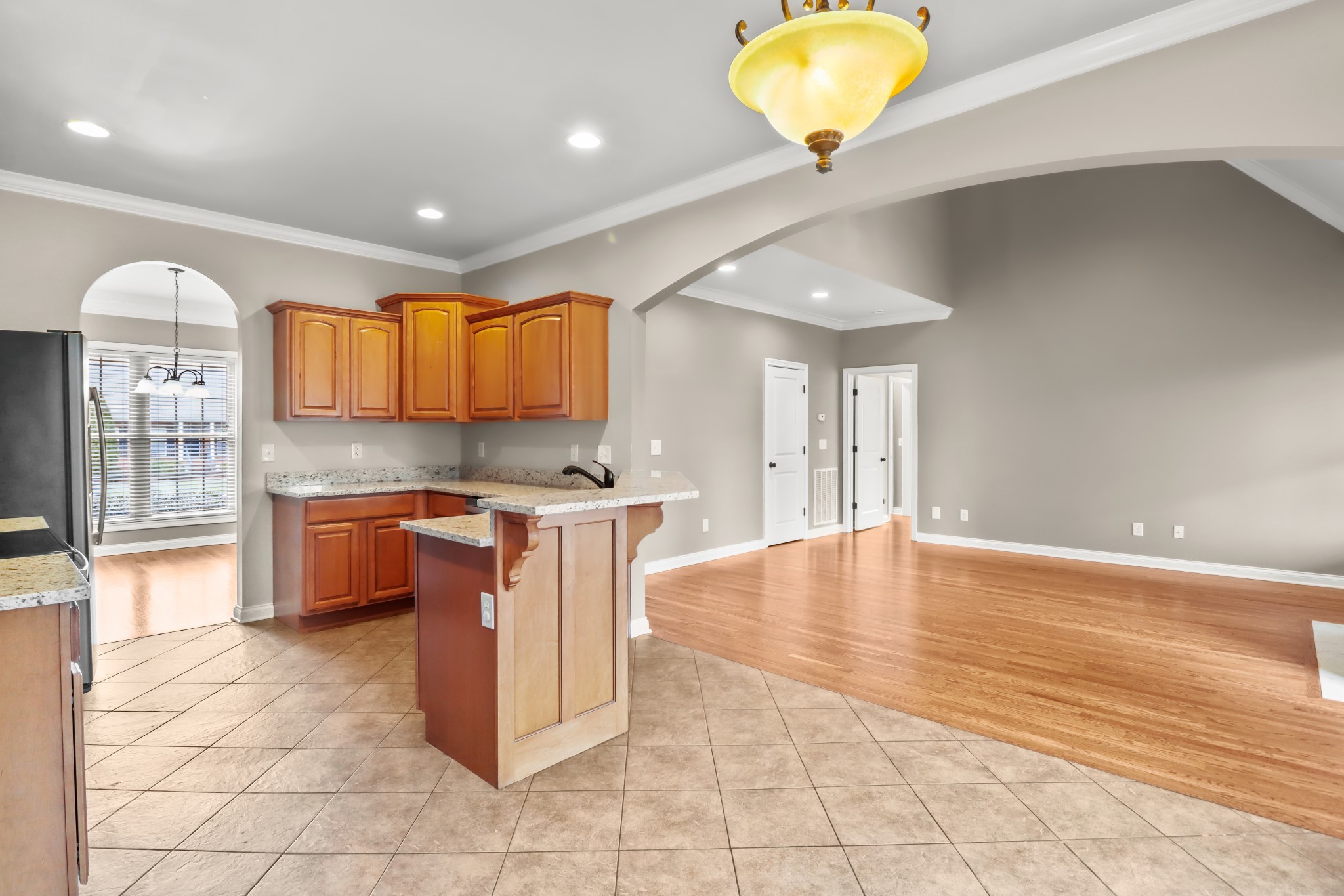 331 Tivoli Trail Springfield, TN 37172 - Photo 19 of 44 a kitchen with stainless steel appliances granite countertop a stove and cabinets