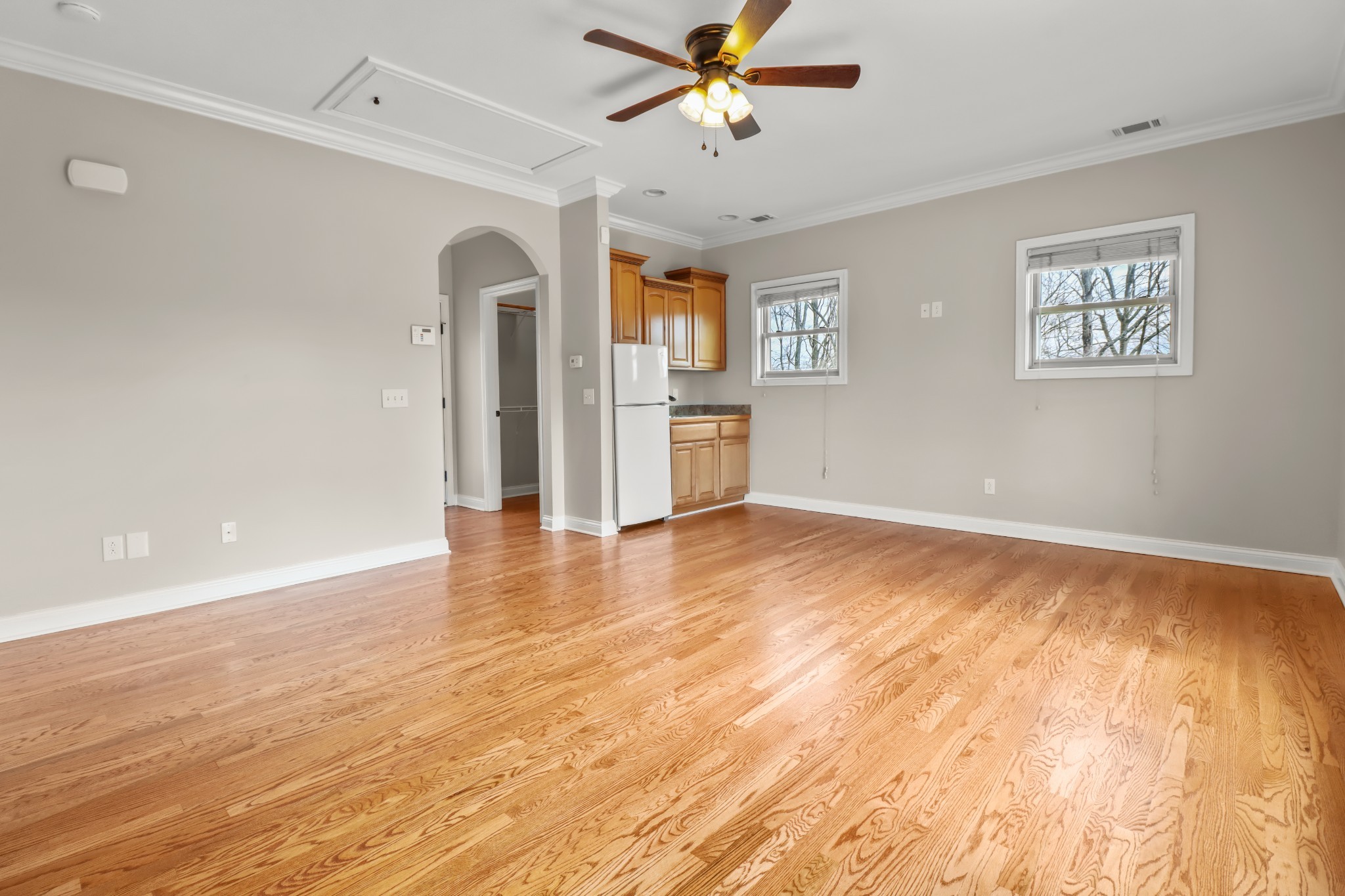 331 Tivoli Trail Springfield, TN 37172 - Photo 27 of 44 a view of a room with wooden floor window and a ceiling fan