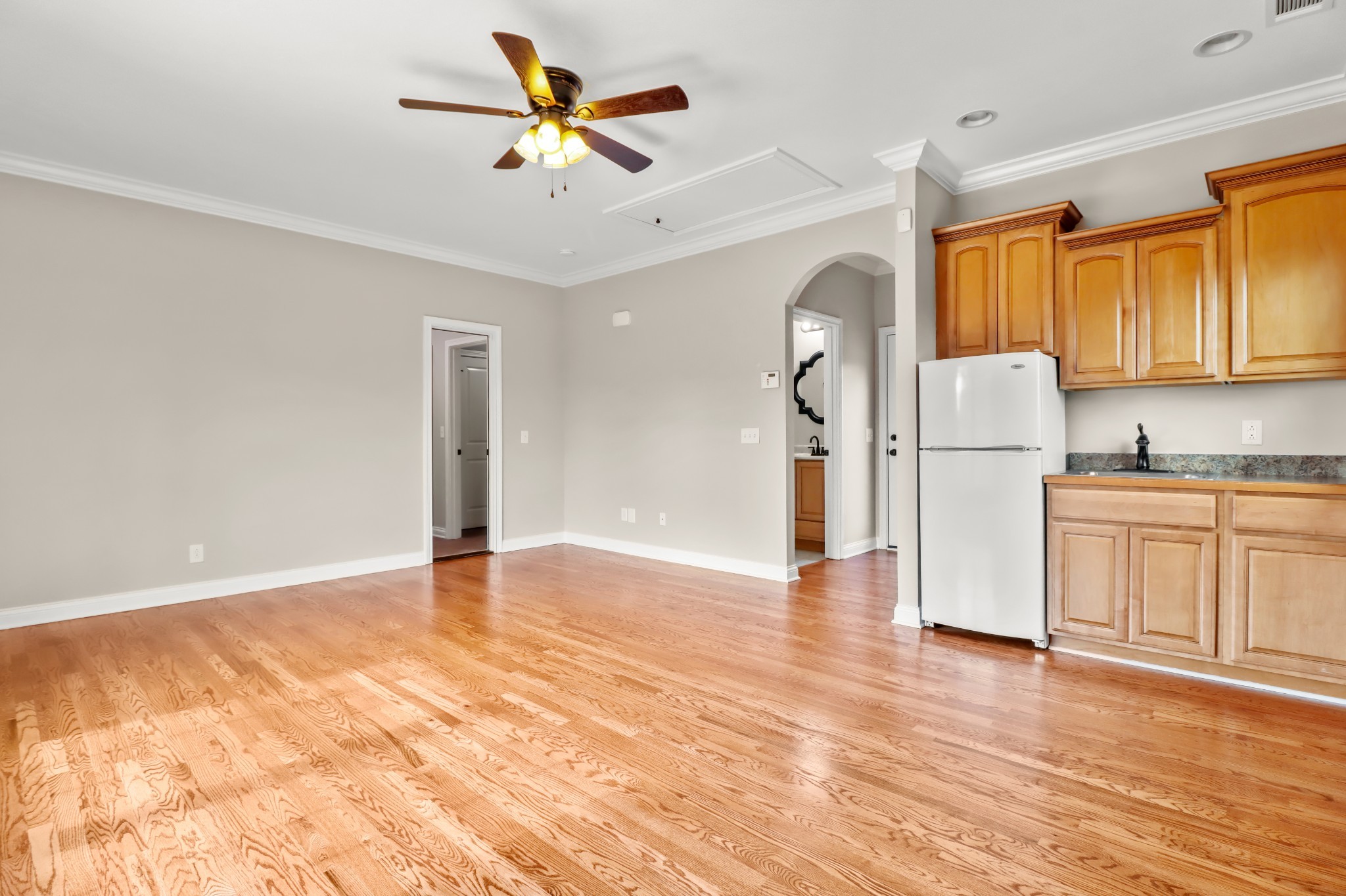 331 Tivoli Trail Springfield, TN 37172 - Photo 28 of 44 a view of a kitchen with a sink dishwasher a refrigerator with wooden floor and cabinets