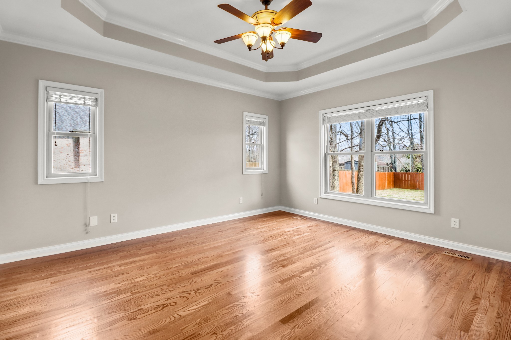 331 Tivoli Trail Springfield, TN 37172 - Photo 31 of 44 a view of an empty room with a window and wooden floor