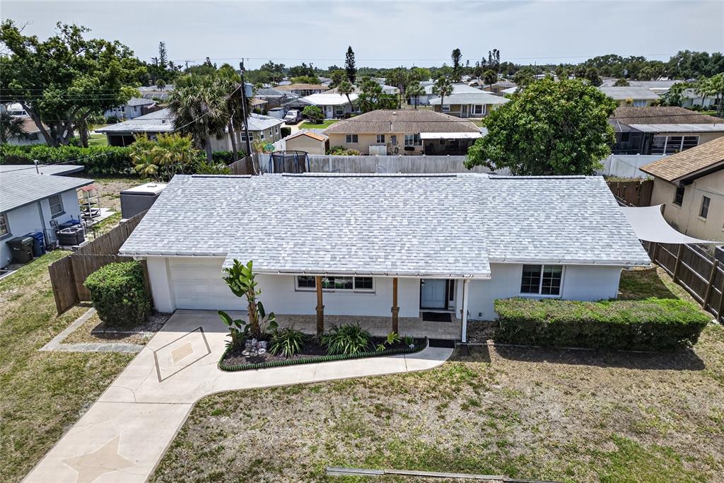 532 Center Road Venice, FL 34285 - Photo 6 of 68 a aerial view of a house with a yard and potted plants
