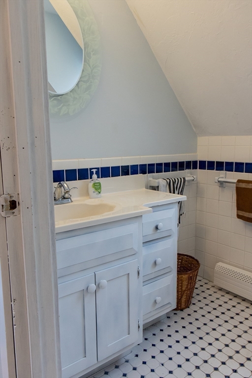 20 Paige Hill Road Brimfield, MA 01010 - Photo 29 of 40 a bathroom with a sink a toilet and a mirror