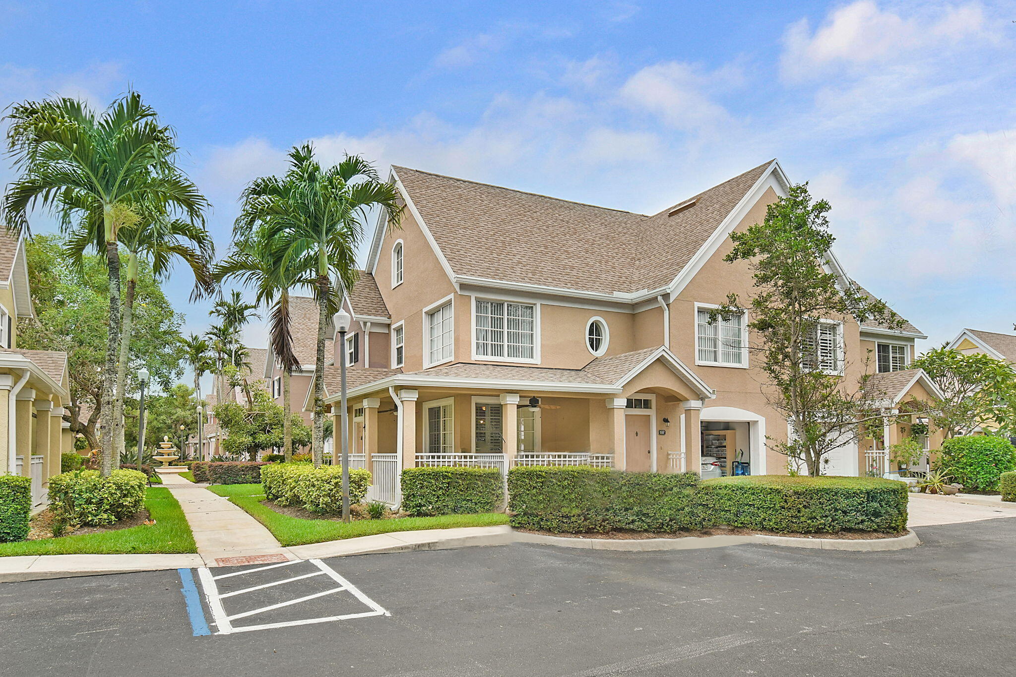 1595 Southeast Pomeroy Street Stuart, FL 34997 - Photo 2 of 2 a front view of a house with a yard