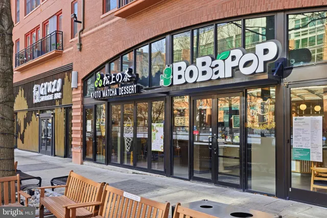 a row of building with trees in front of it