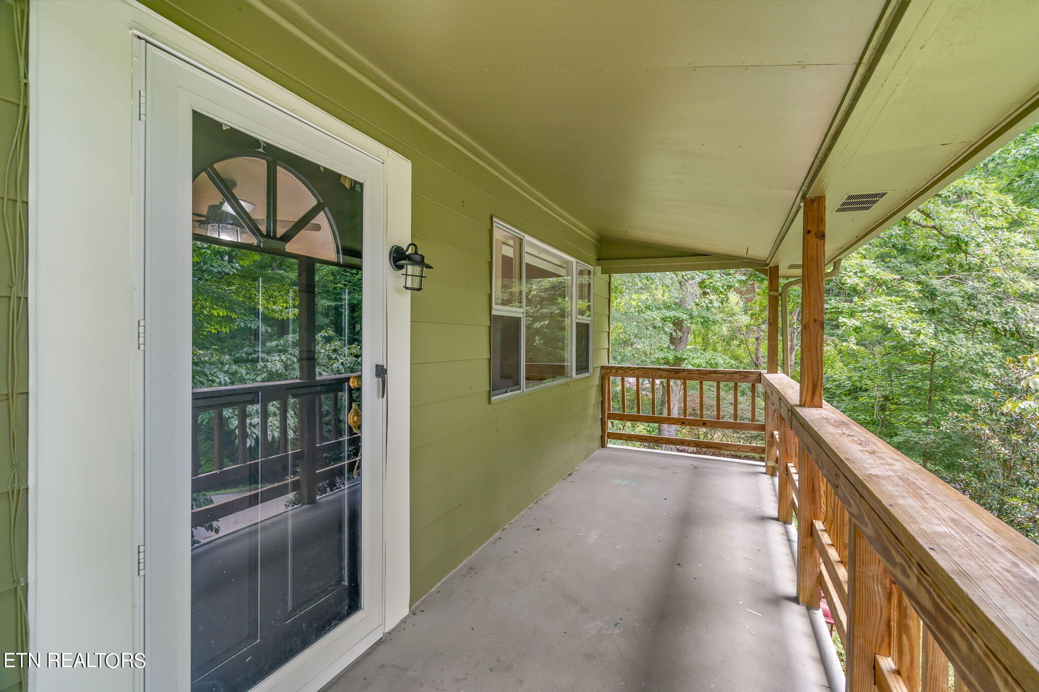 408 Delaware Avenue Oak Ridge, TN 37830 - Photo 7 of 35 a view of front door and deck of the house