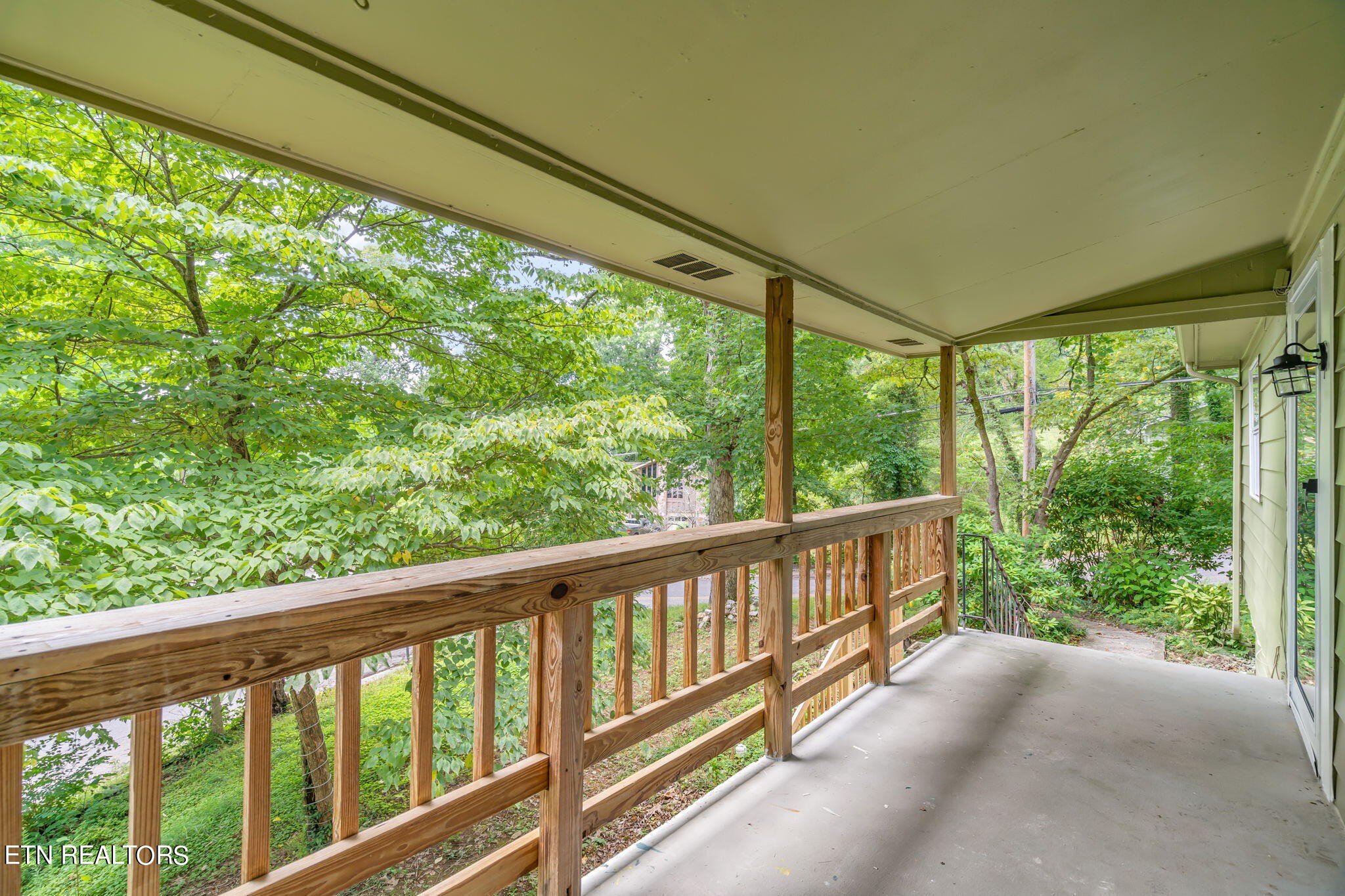408 Delaware Avenue Oak Ridge, TN 37830 - Photo 8 of 35 a view of a porch with a yard