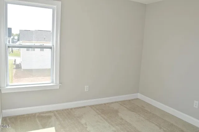 a view of an empty room with window