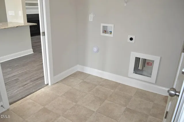 a view of a house with a backyard and a window