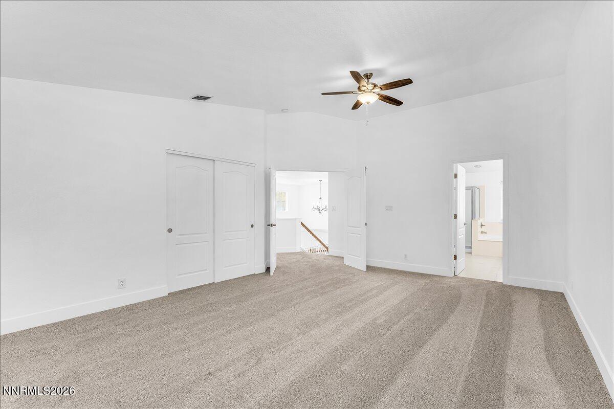 2329 Red Maple Court Reno, NV 89523 - Photo 21 of 39 an empty room with a ceiling fan and a window