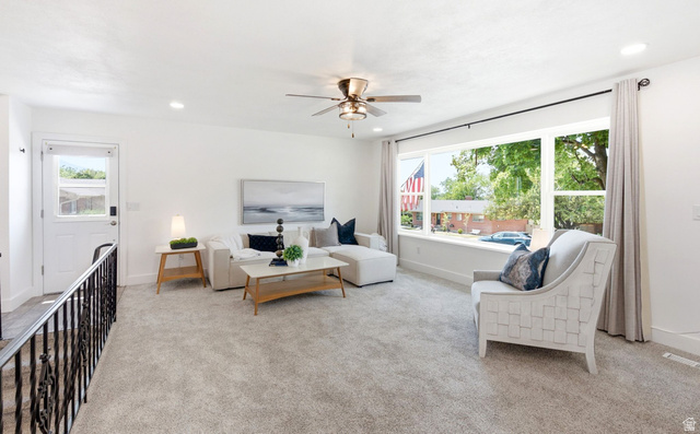 120 North 1230 E Street Springville, UT 84663 - Photo 7 of 60 Bright living area featuring a large picture window, recessed lighting, a ceiling fan, and light-toned carpeting