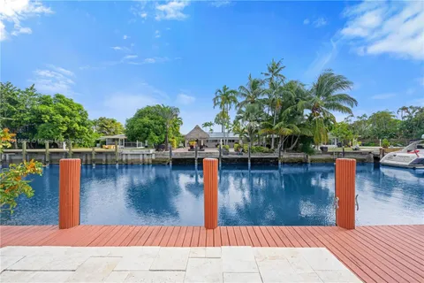 a view of a swimming pool with a lake view