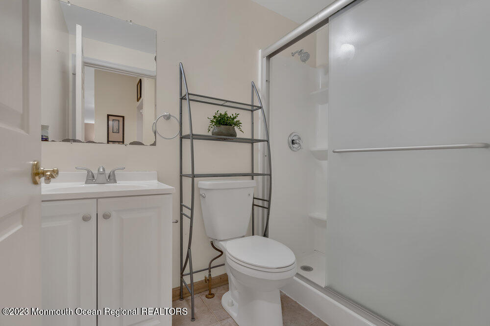 4 Blacksmith Pass Colts Neck, NJ 07722 - Photo 13 of 38 a bathroom with a sink a toilet and shower