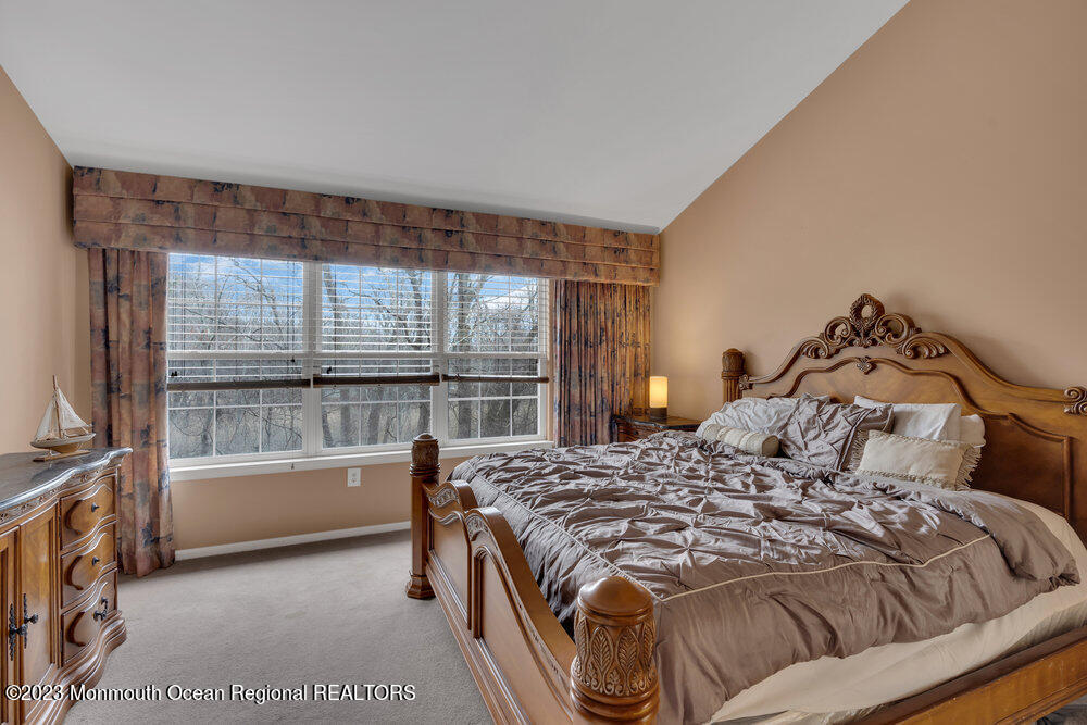 4 Blacksmith Pass Colts Neck, NJ 07722 - Photo 16 of 38 a bedroom with a bed and a window