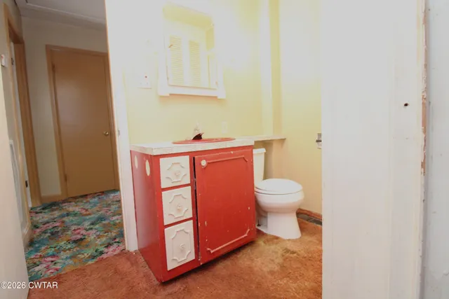 a bathroom with a toilet