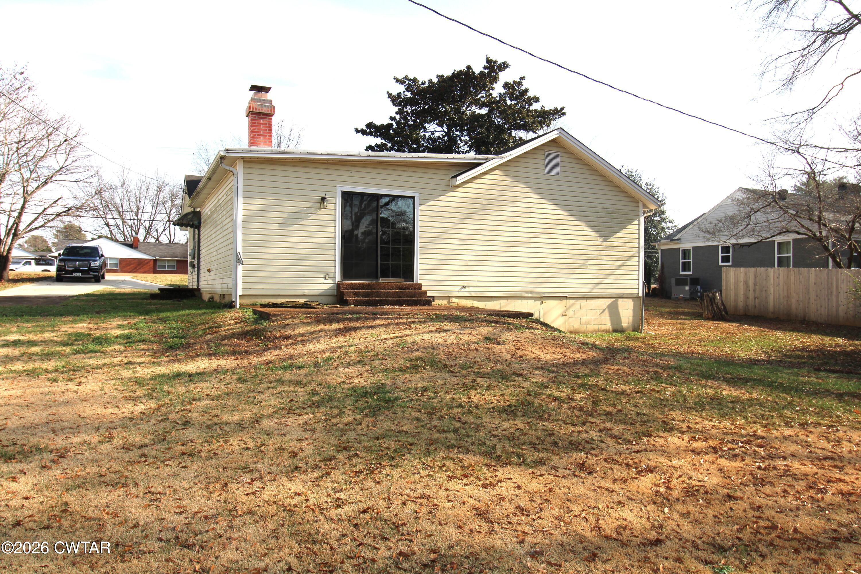 583 Broad Street North Lexington, TN 38351 - Photo 13 of 14 a view of a house with a yard