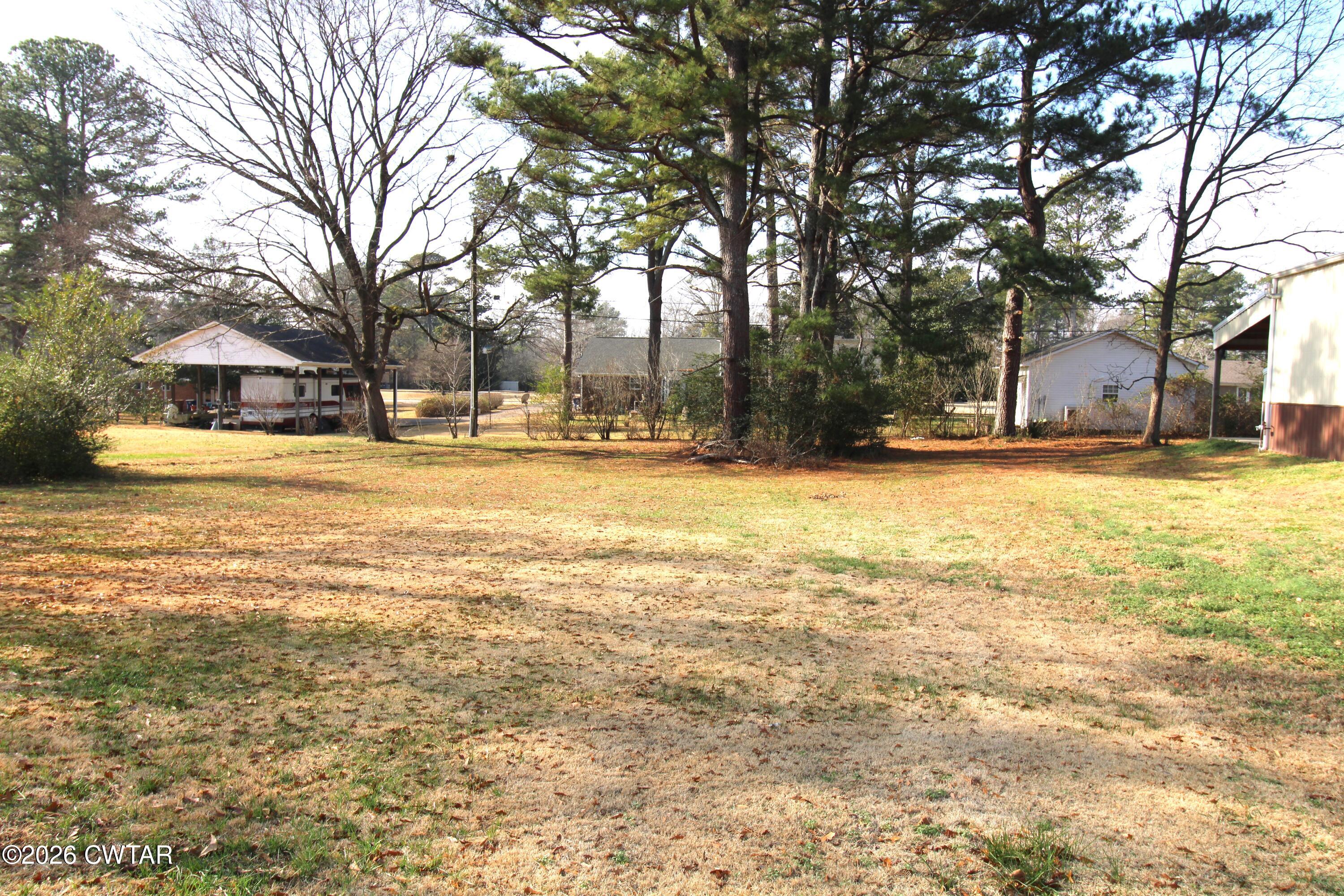 583 Broad Street North Lexington, TN 38351 - Photo 14 of 14 a view of a yard with a house