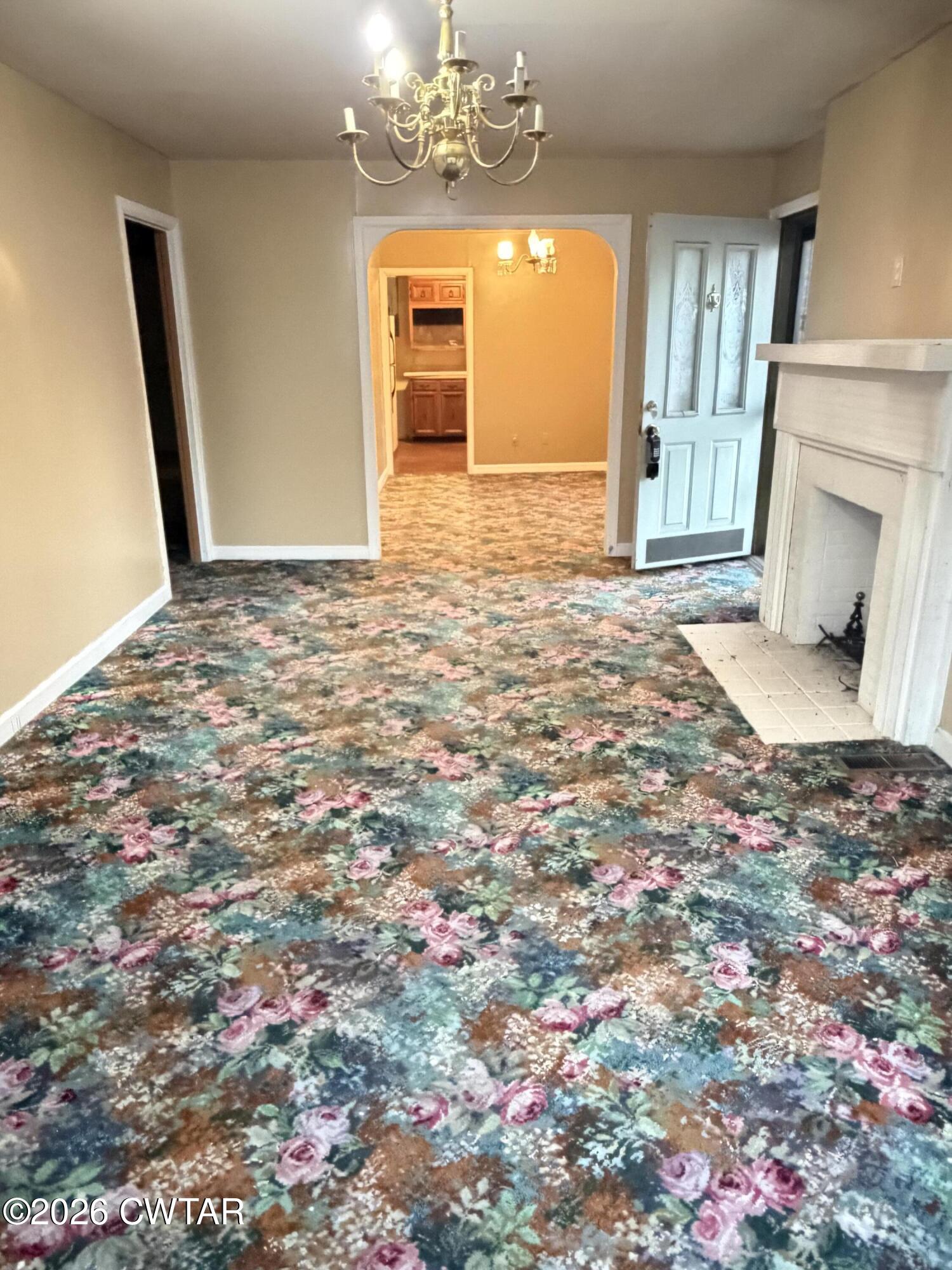 583 Broad Street North Lexington, TN 38351 - Photo 3 of 14 a view of a livingroom with a chandelier