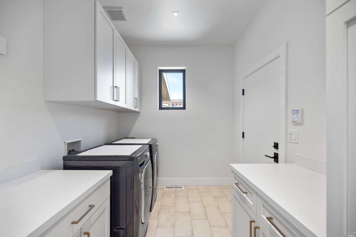 3754 St Andrews Drive Santa Rosa, CA 95403 - Photo 26 of 37 Main Level laundry room and entrance to garage