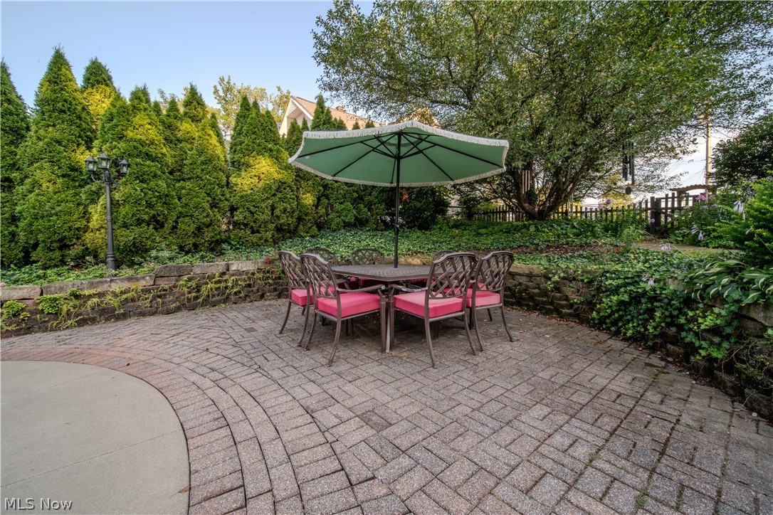 6549 Waterloo Road Atwater, OH 44201 - Photo 43 of 49 Expansive brick paver patio featuring a circular concrete border