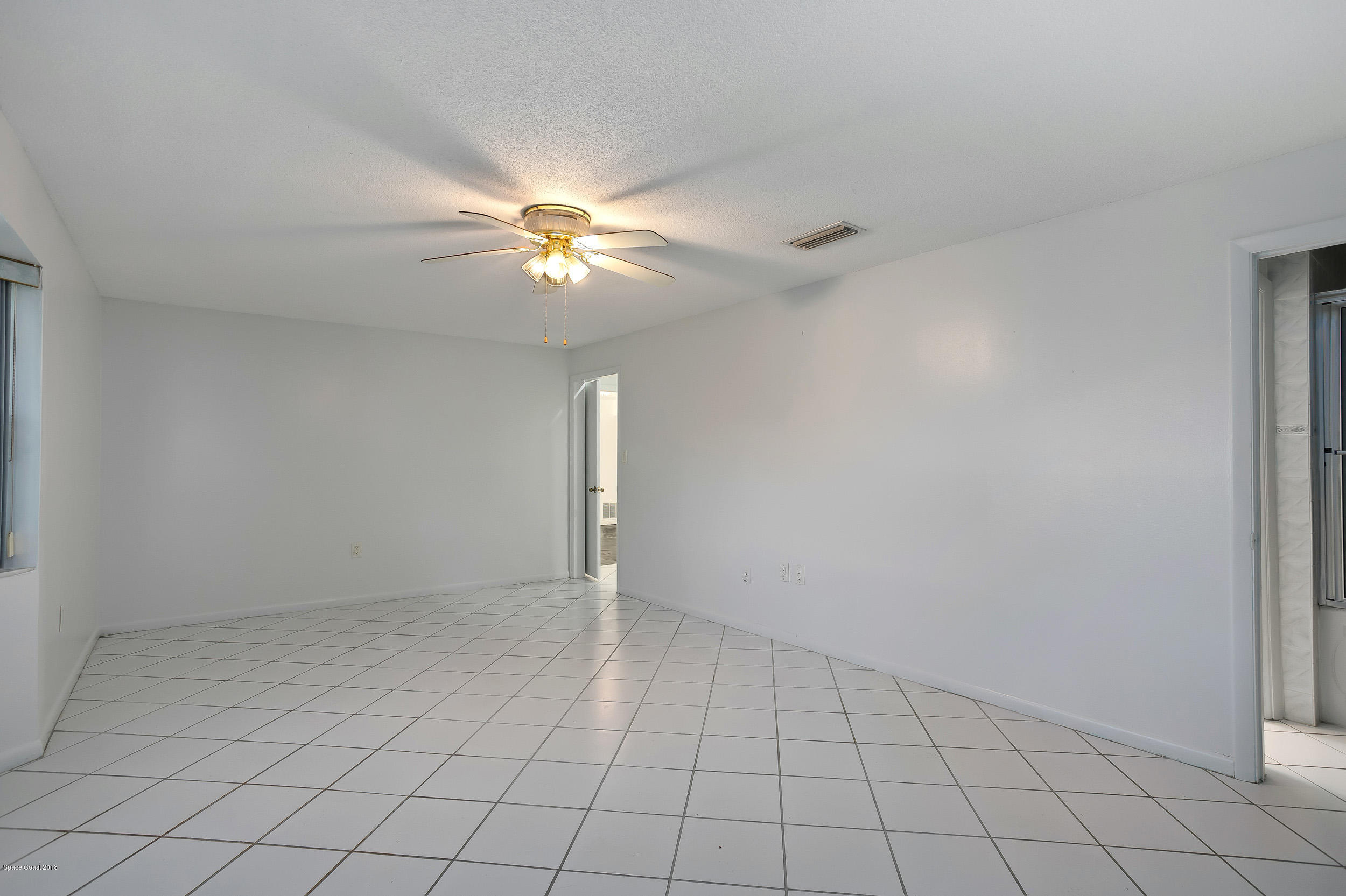 120 La Riviere Road Cocoa Beach, FL 32931 - Photo 11 of 33 Master Bed
