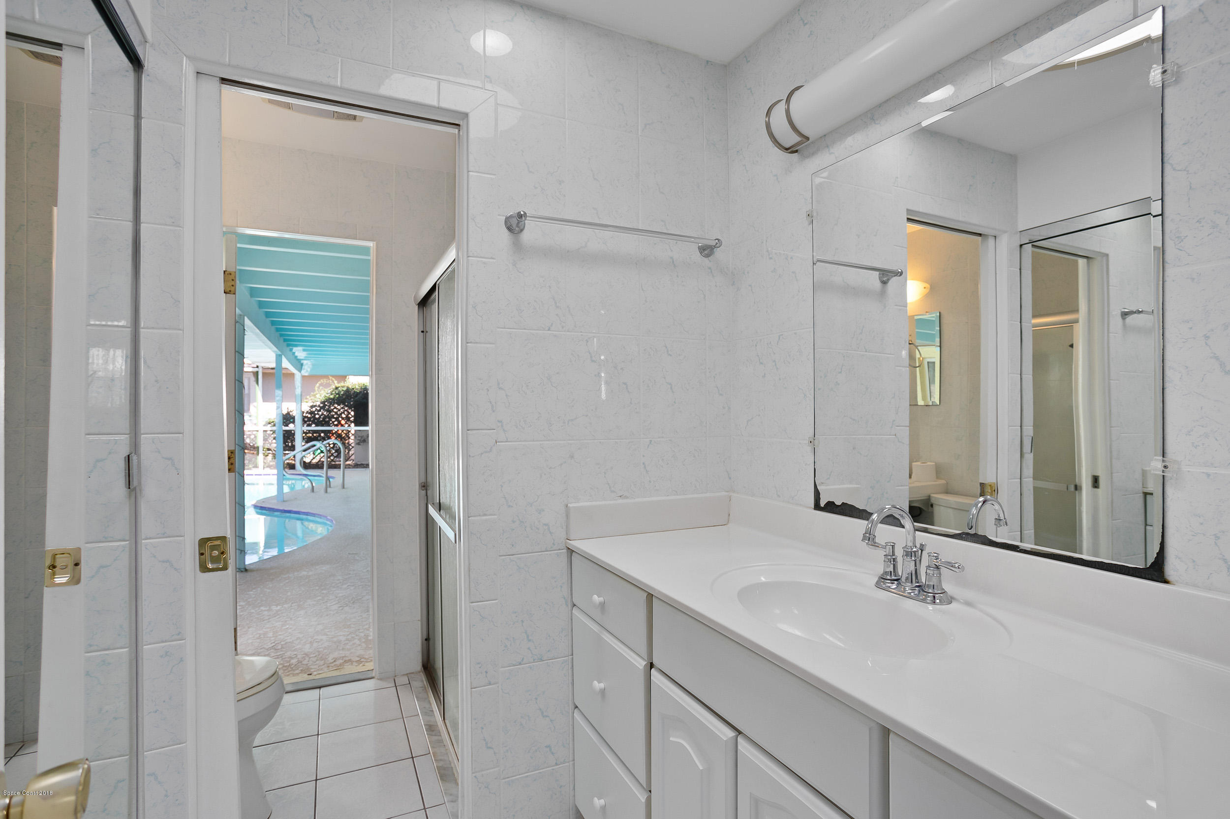 120 La Riviere Road Cocoa Beach, FL 32931 - Photo 16 of 33 Guest and Pool Bathroom