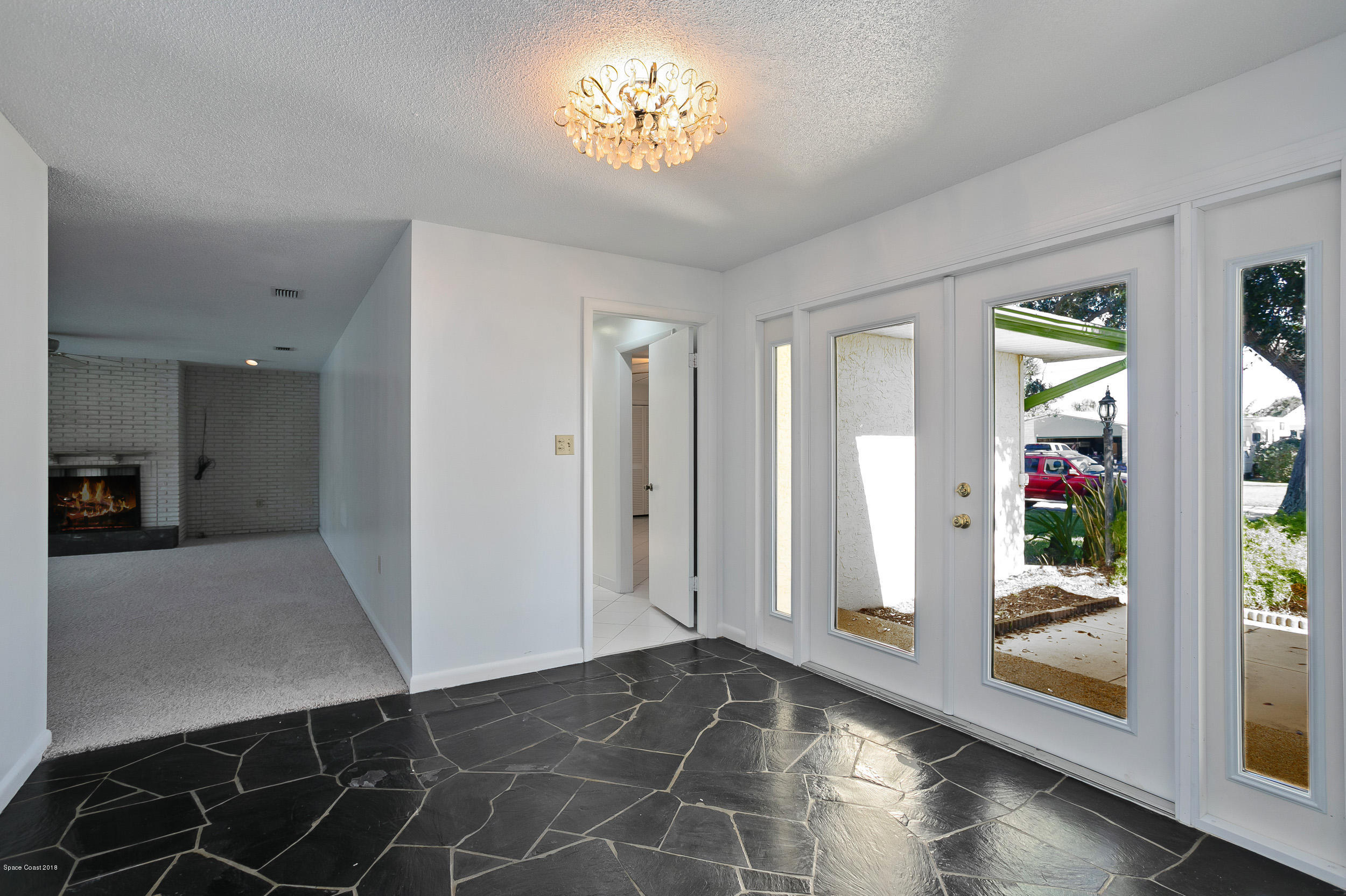 120 La Riviere Road Cocoa Beach, FL 32931 - Photo 7 of 33 Main Entrance