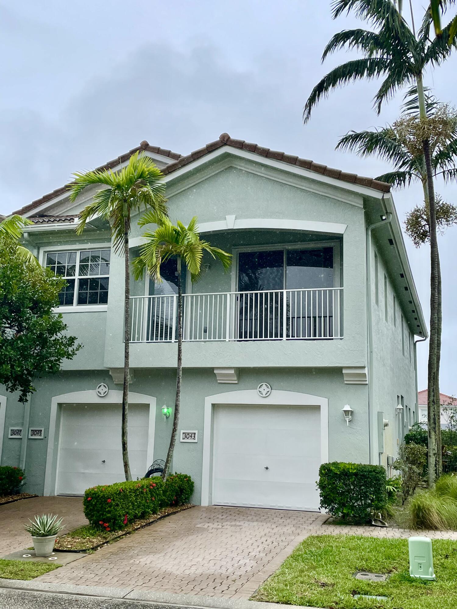 3043 Laurel Ridge Circle Riviera Beach, FL 33404 - Photo 1 of 35 FACADE 2