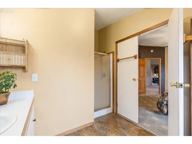 a kitchen with a sink stove top oven and cabinets