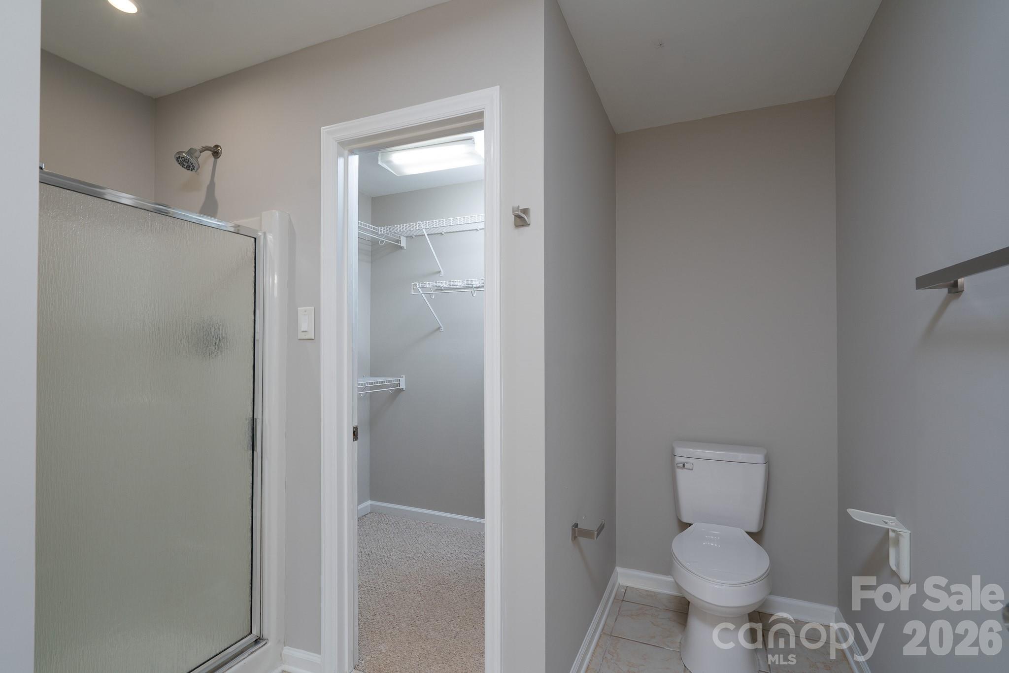 5356 Zion Church Road Concord, NC 28025 - Photo 20 of 46 a bathroom with a toilet and a shower