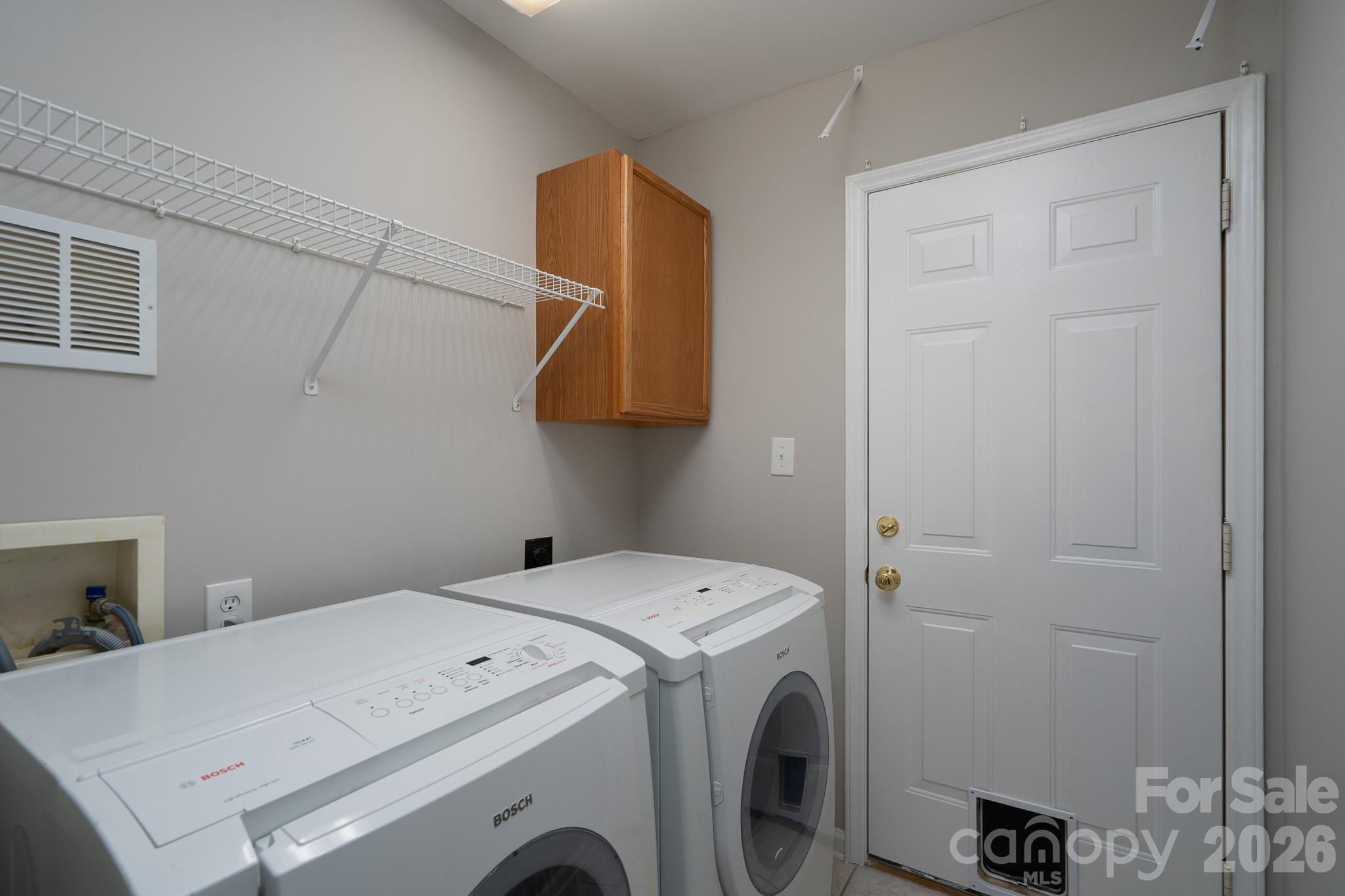 5356 Zion Church Road Concord, NC 28025 - Photo 22 of 46 a utility room with dryer and washer