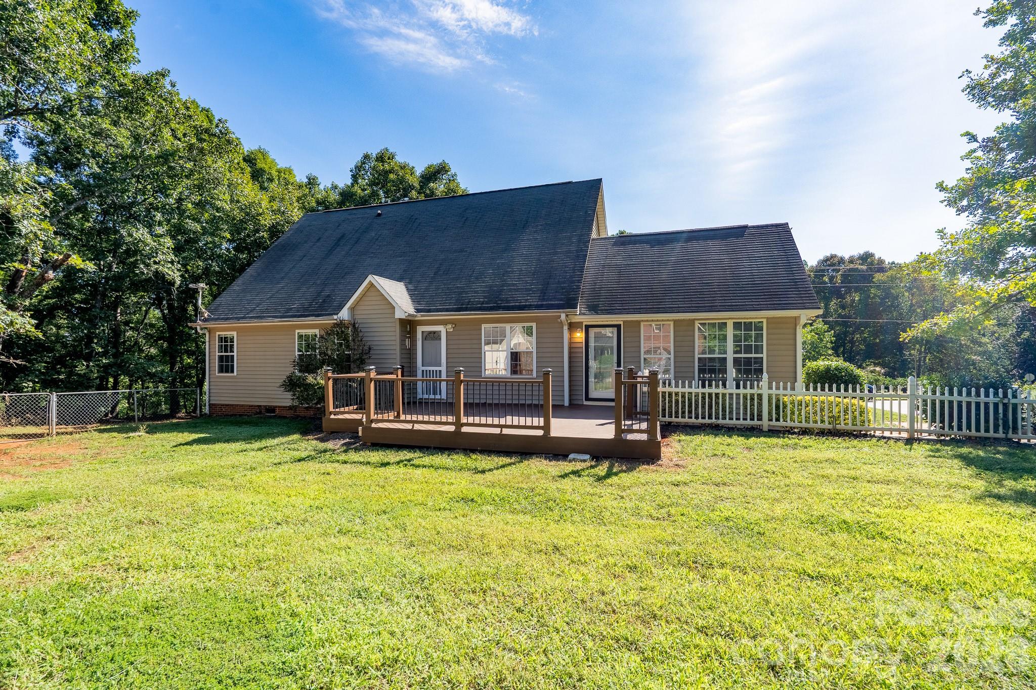 5356 Zion Church Road Concord, NC 28025 - Photo 30 of 46 a view of a house with swimming pool and sitting area
