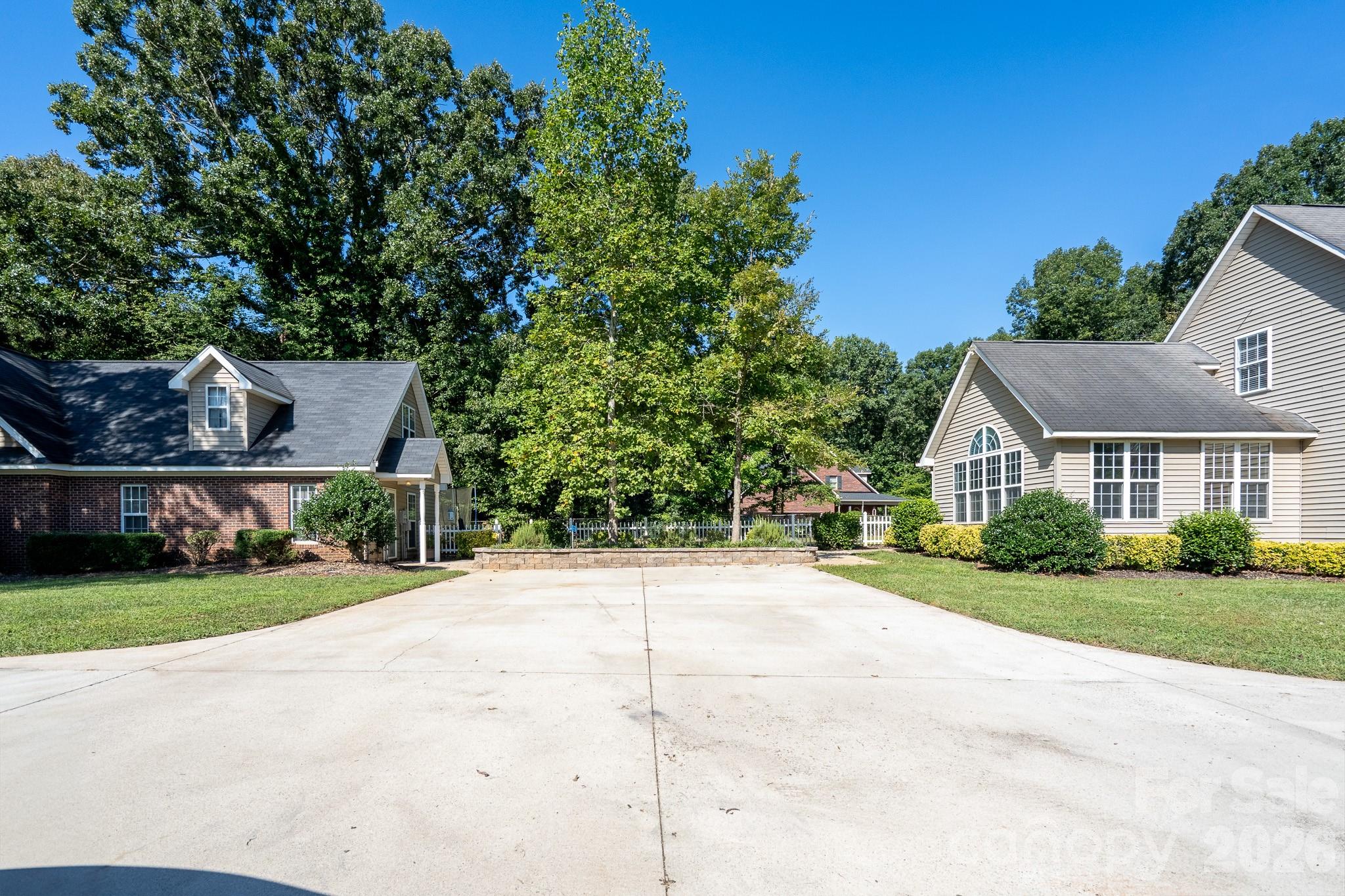 5356 Zion Church Road Concord, NC 28025 - Photo 35 of 46 a front view of a house with a yard and garage