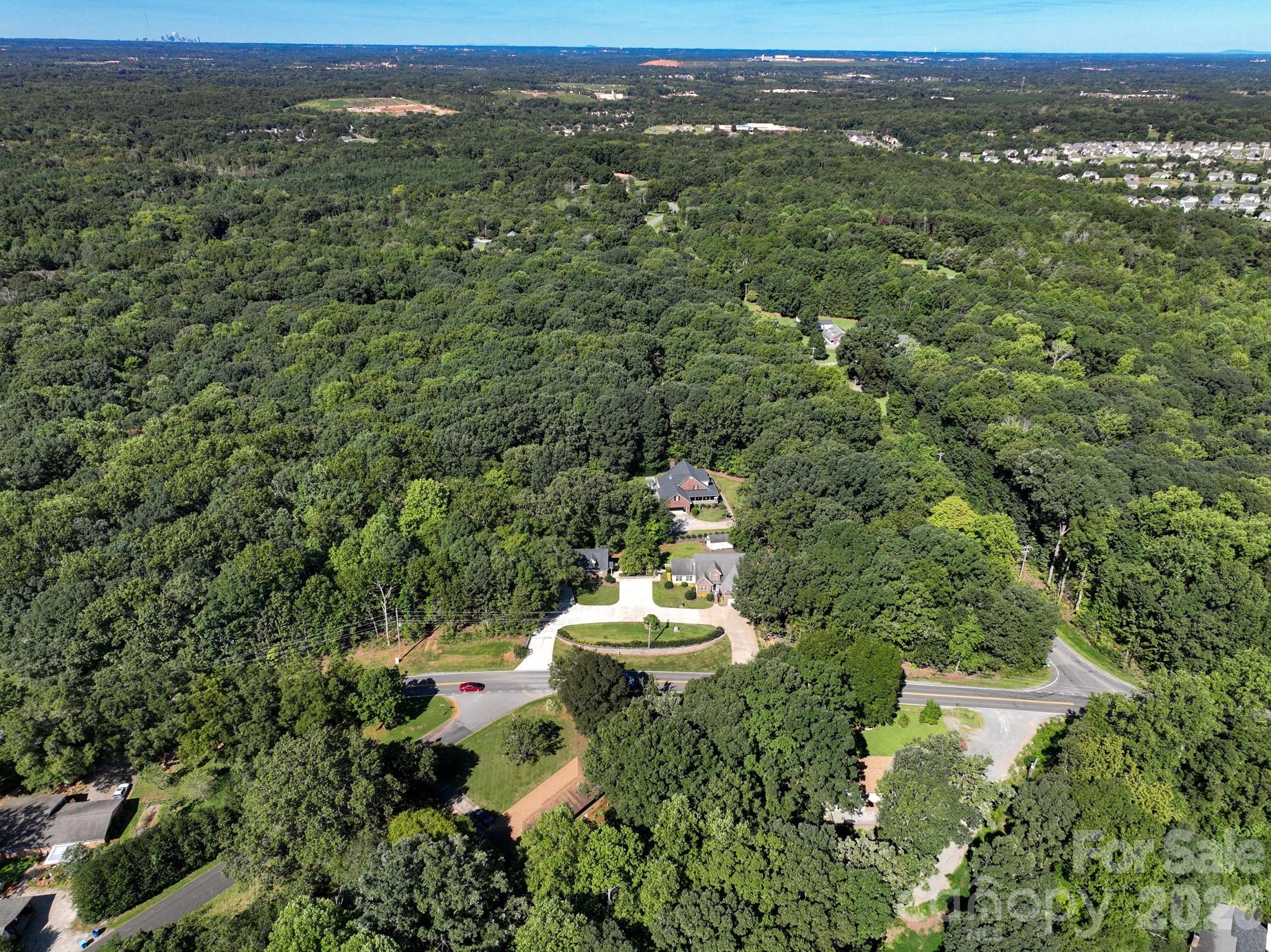 5356 Zion Church Road Concord, NC 28025 - Photo 46 of 46 an aerial view of a house with a yard