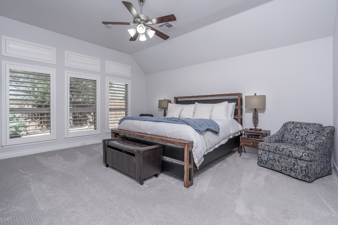 1232 Lakeside Ranch Road Georgetown, TX 78633 - Photo 19 of 31 a bedroom with bed and window