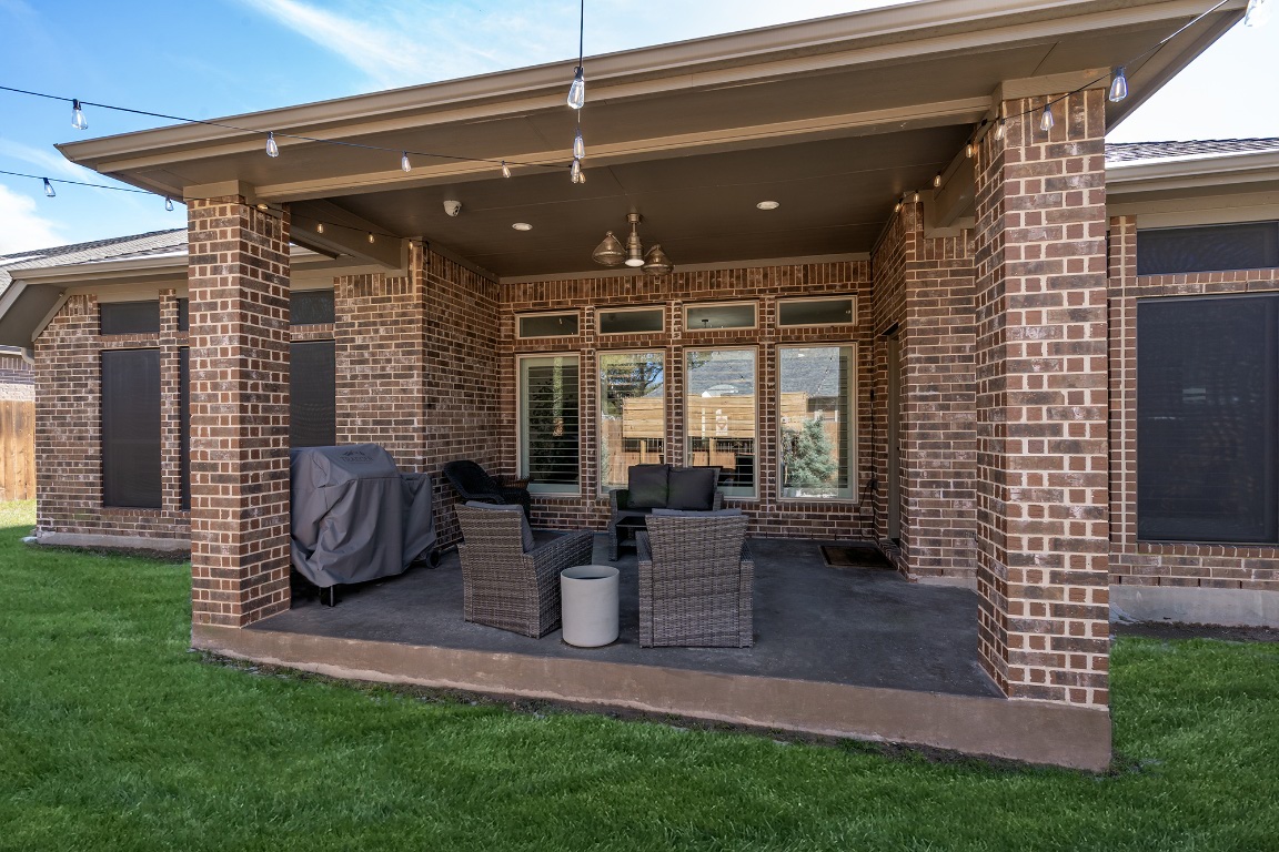 1232 Lakeside Ranch Road Georgetown, TX 78633 - Photo 29 of 31 a view of outdoor dining space with furniture and garden