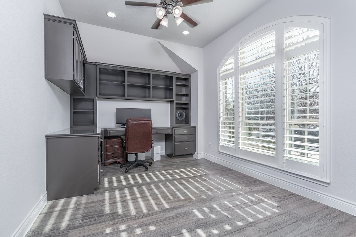 1232 Lakeside Ranch Road Georgetown, TX 78633 - Photo 6 of 31 a view of a livingroom with a chair and a large window