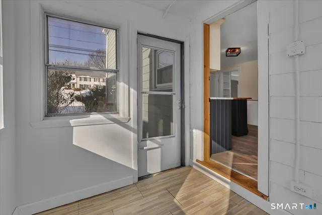 a bathroom with a tub and shower