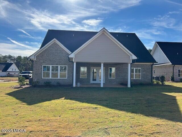 124 Camden Road Macon, GA 31210 - Photo 2 of 18 a view of a yard in front of house with a big yard