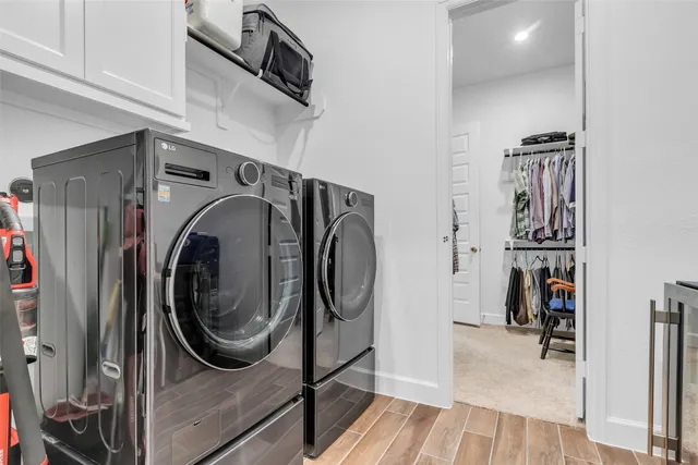 a room with gym equipment and view of living room
