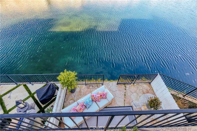 an aerial view of a house a garden and patio