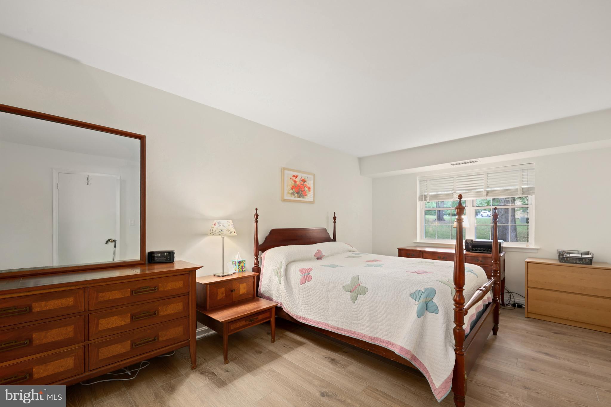 5837 Cove Landing Road, Unit 101 Burke, VA 22015 - Photo 17 of 35 a bedroom with a bed and window