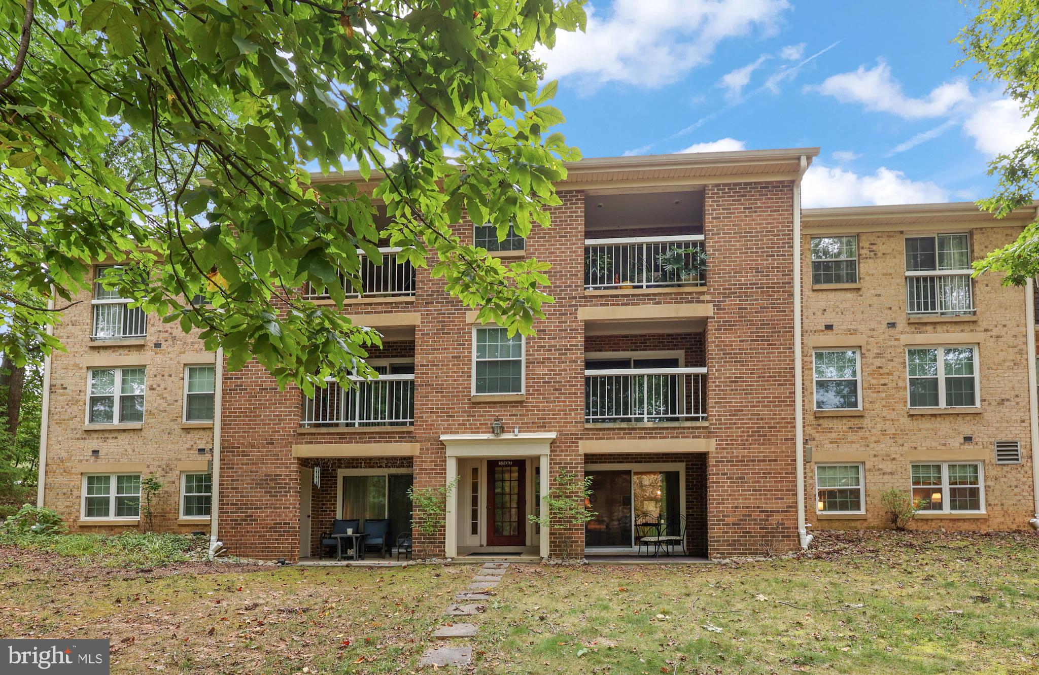 5837 Cove Landing Road, Unit 101 Burke, VA 22015 - Photo 3 of 35 front view of a house