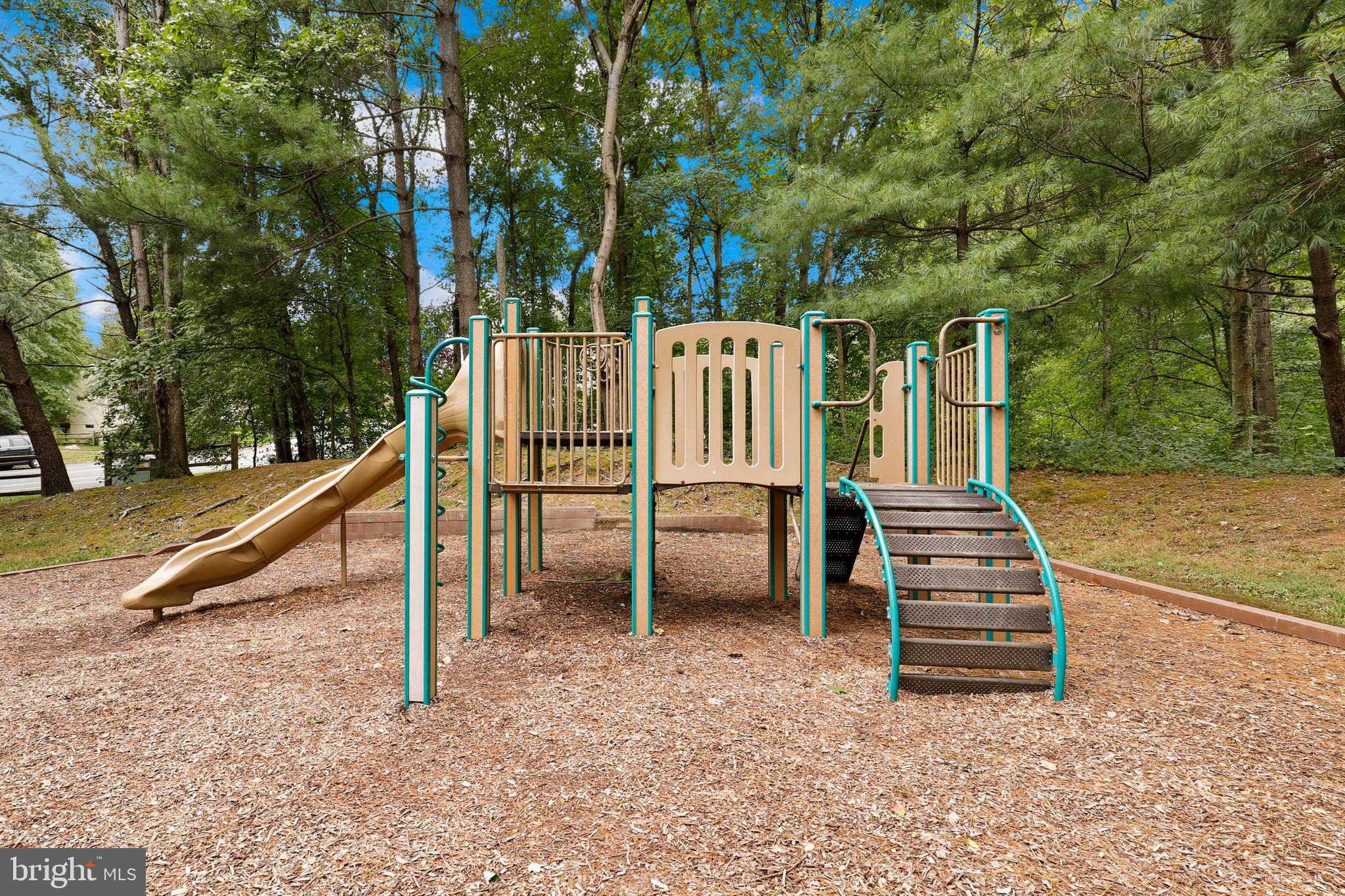 5837 Cove Landing Road, Unit 101 Burke, VA 22015 - Photo 31 of 35 a view of a deck with a backyard