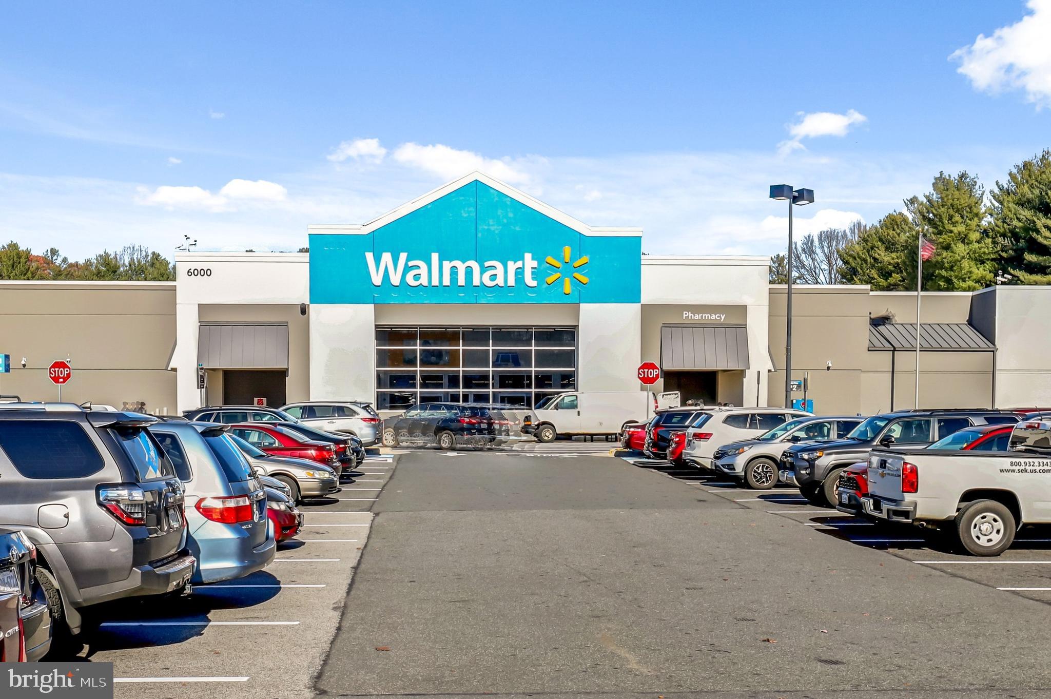 5837 Cove Landing Road, Unit 101 Burke, VA 22015 - Photo 33 of 35 a car parked in front of a building
