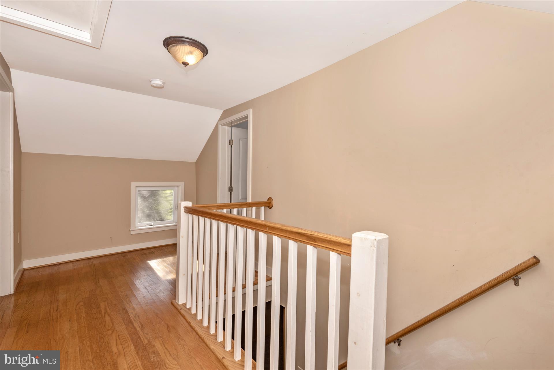 20326 Locust Grove Road Rohrersville, MD 21779 - Photo 22 of 47 a view of a hallway with wooden floor
